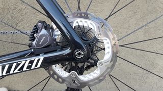 Shimano's BR-RS785 flat-mount hydraulic disc brake and RT99-S center lock disc rotor in 160mm