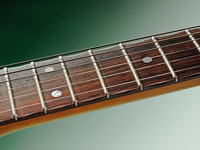 Heavily-rolled fingerboard edges give a played-in feel
