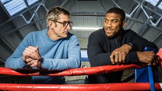Louis chats with Anthony Joshua in a boxing ring for Louis Theroux Interviews season 2. 