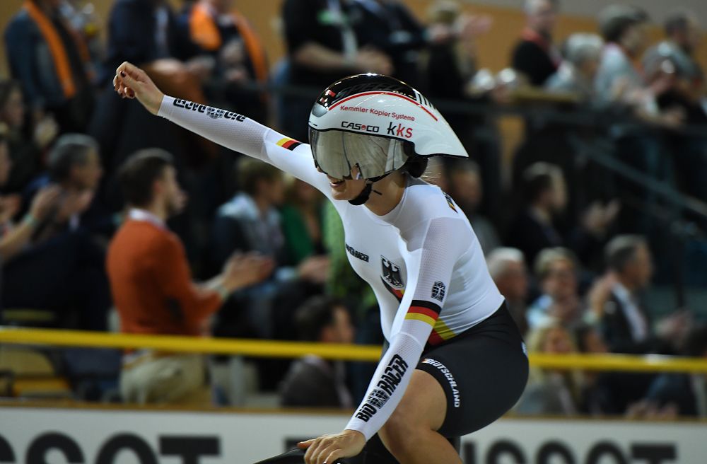 Germany's Miriam Welte celebrates after victory in the women's team sprint final race at The UCI World Cycling Championships in Apeldoorn