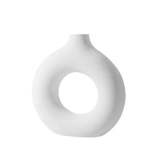round white vase with cut-out in the middle
