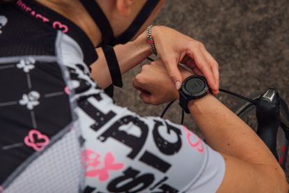 Image shows a rider using a wearable device.