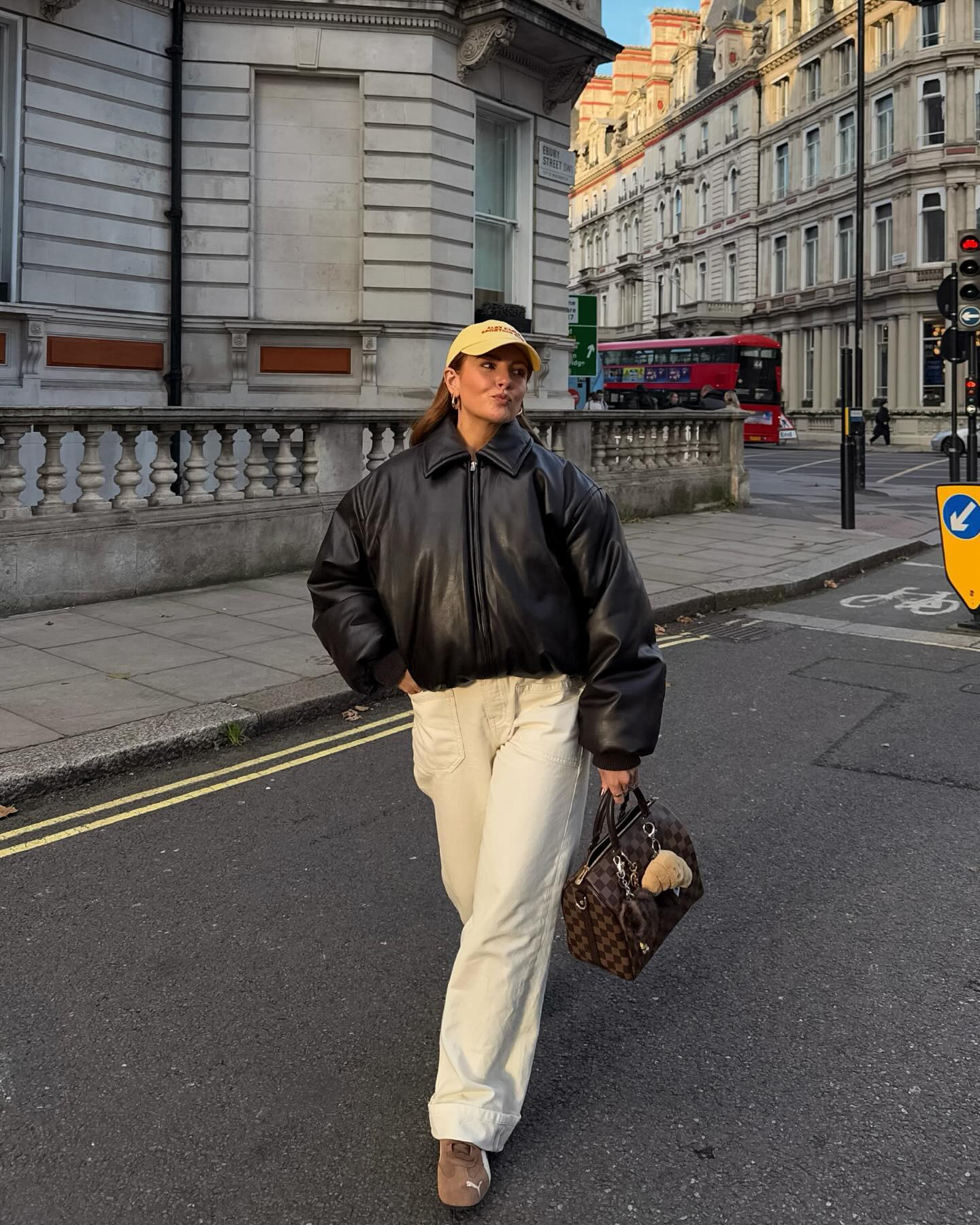 Rebecca in an outfit with brown trainers