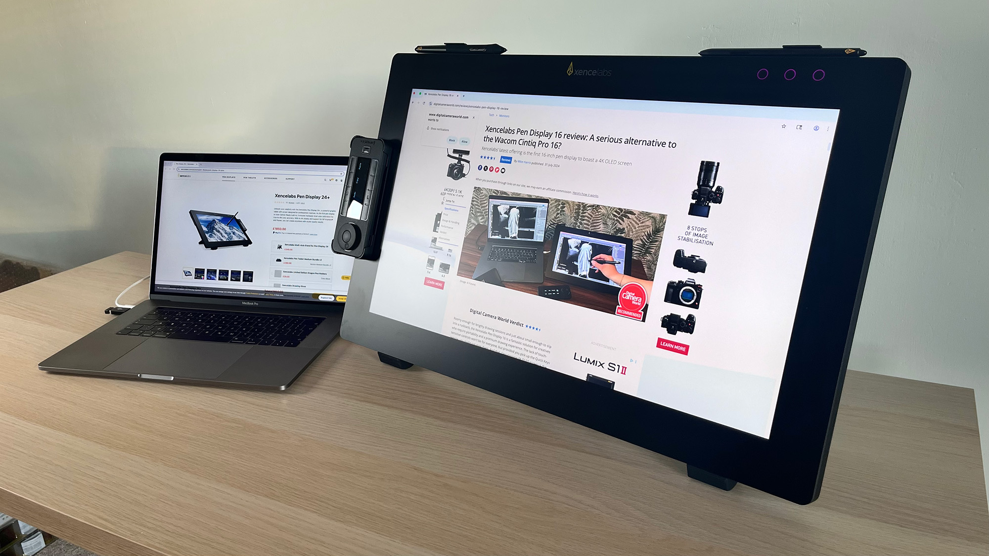 Xencelabs Pen Display 24+ being used as second monitor next to MacBook, both with web pages on screen