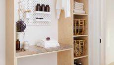 a laundry room with clean linen in 