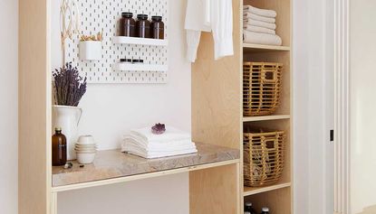 a laundry room with clean linen in 