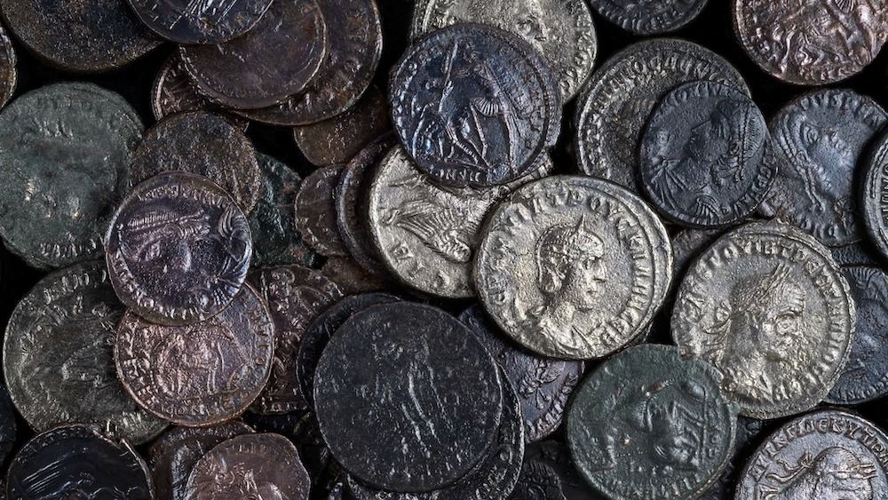 Dozens of silver and bronze coins 