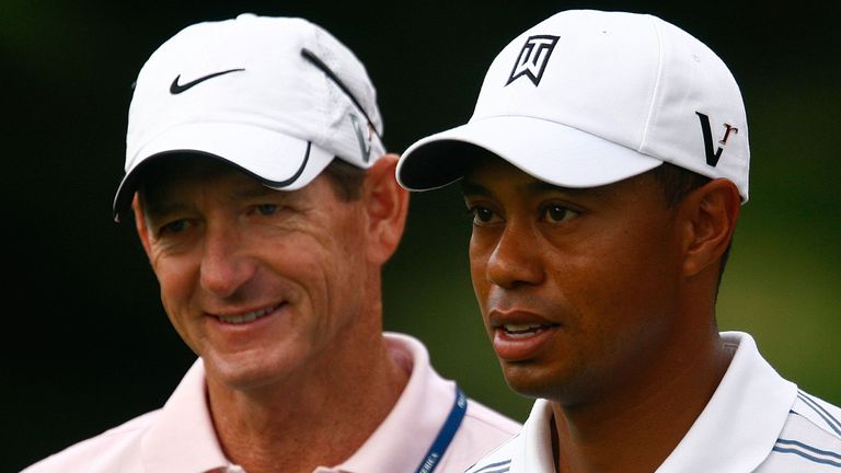 Hank Haney speaks to Tiger Woods before the 2009 PGA Championship