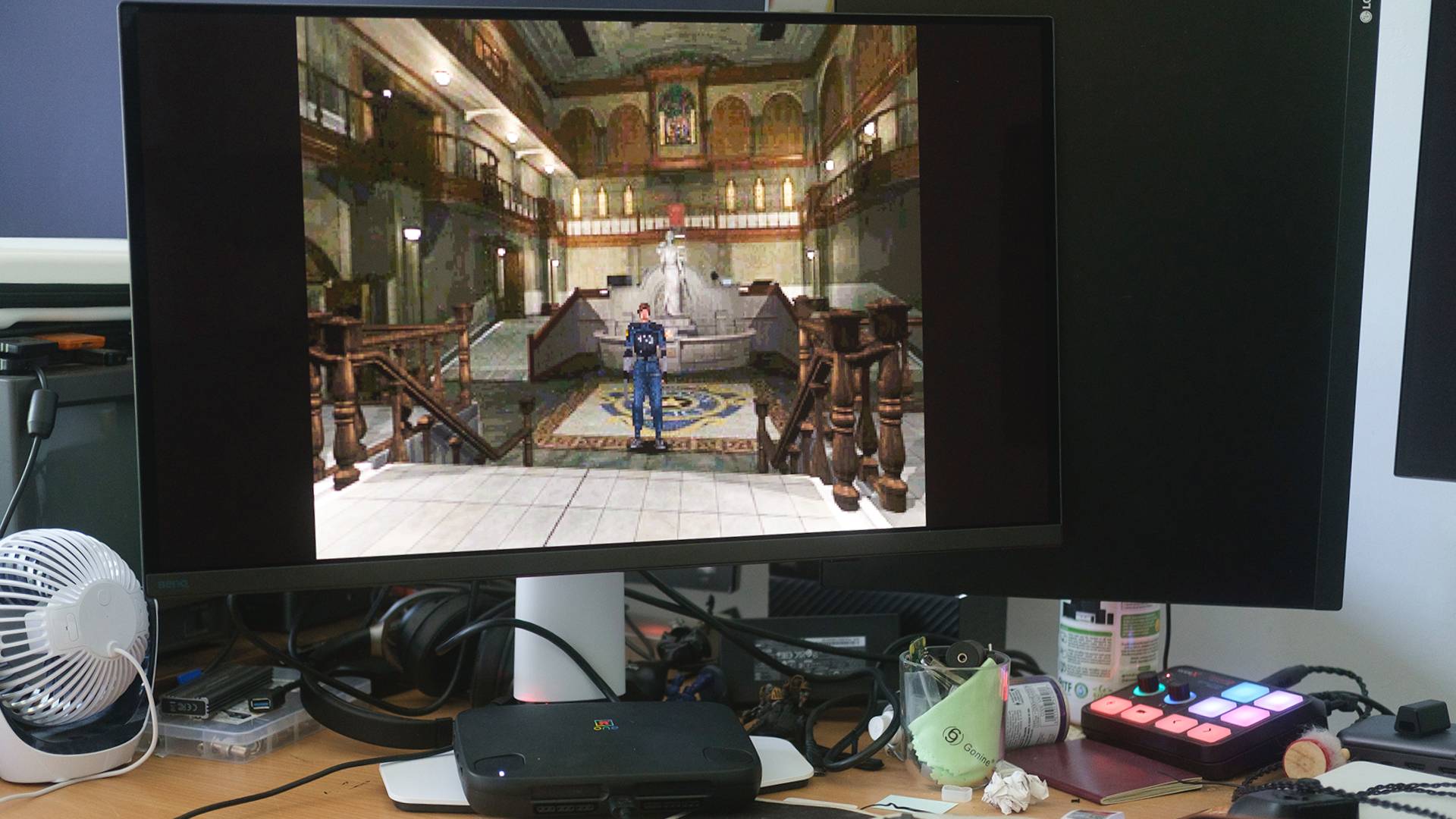 BenQ Mobiuz EX271UZ conneted to SuperStation One FPGA console and Resident Evil 2 gameplay on screen.