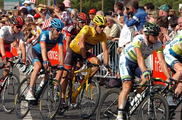 Tejay van Garderen, Christian Vande Velde, Fabian Cancellara and Simon Gerrans round the final turn and head to the finish line in Rouen.