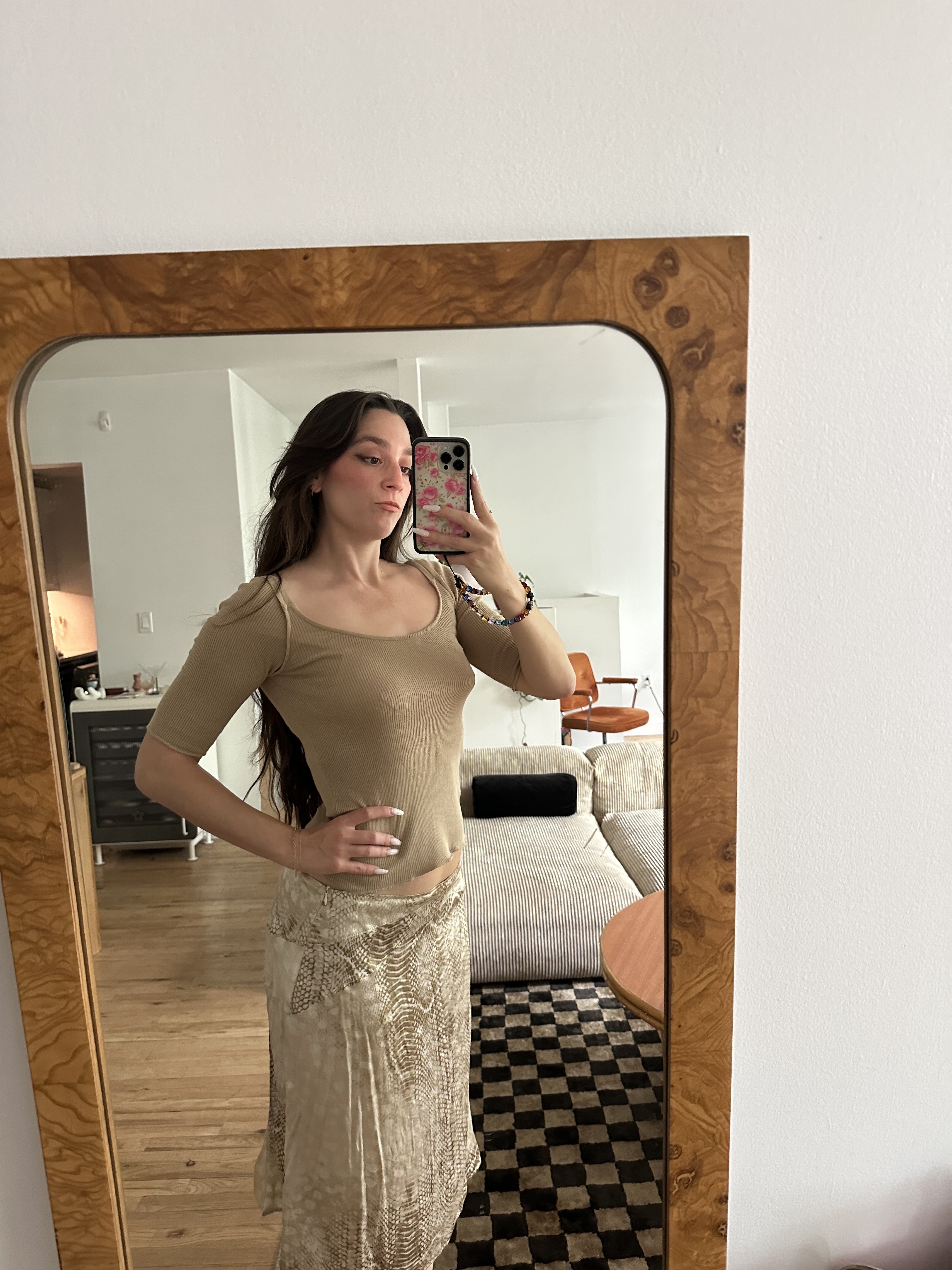 Fashion editor wearing a cone bra in a selfie
