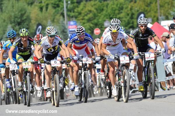 Schurter, Absalon and Vogel at the front at the start of the men's race.