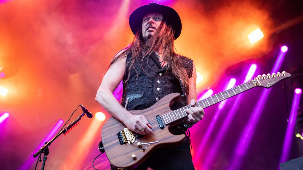 Reb Beach performs onstage