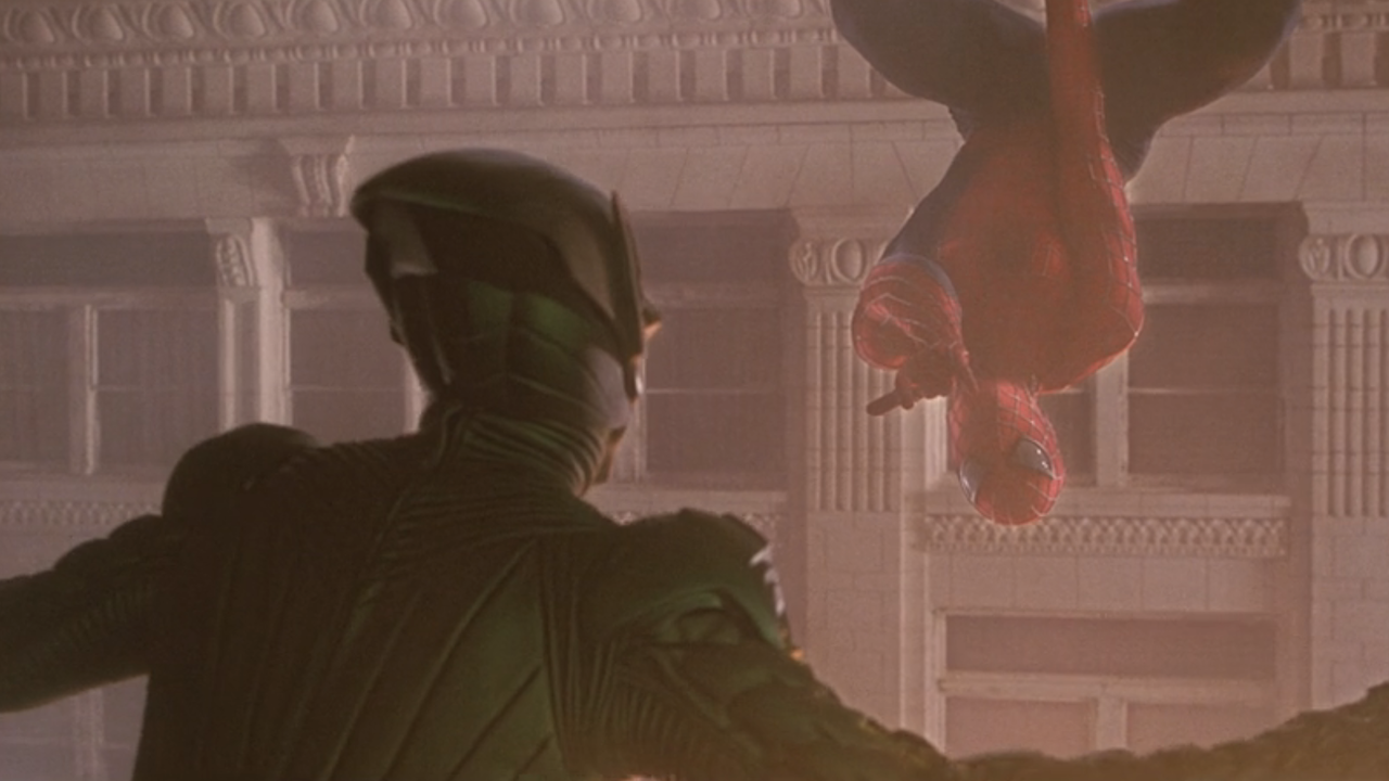 Back of Green Goblin's head and Spider-Man shooting a web at Daily Bugle in Spider-Man 2002