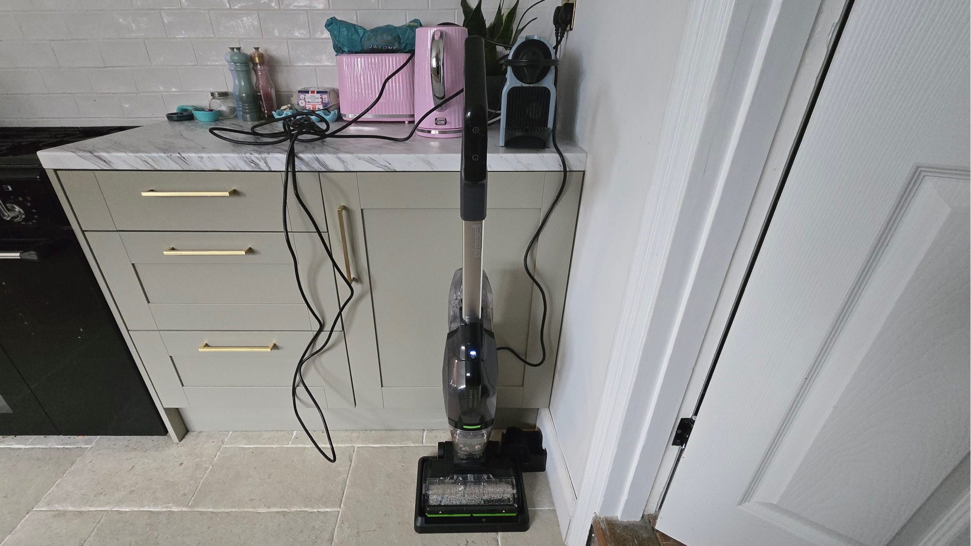 Bissell CrossWave HydroSteam pet resting on kitchen counter