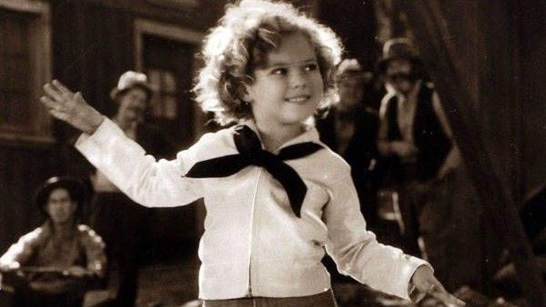 Young Shirley Temple in movie scene