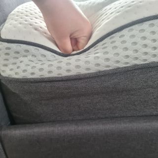 Otty matress being pressed down by a fist