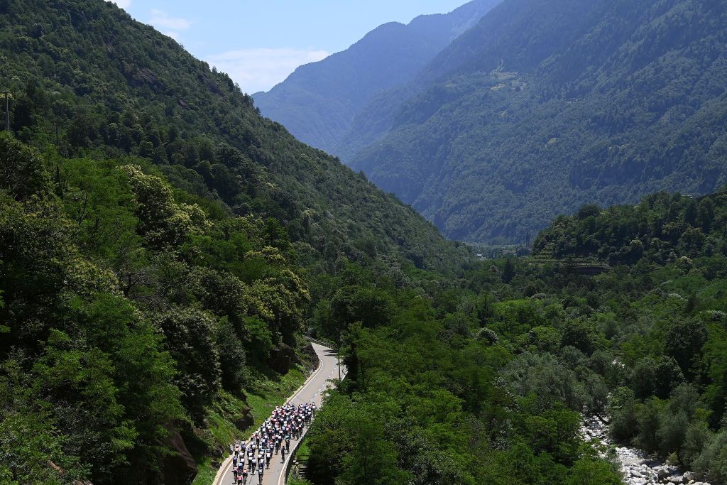 NOVAZZANO SWITZERLAND JUNE 16 A general view of the peloton competing during the 85th Tour de Suisse 2022 Stage 5 a 1901km stage from Ambri to Novazzano 364m ourdesuisse2022 WorldTour on June 16 2022 in Novazzano Switzerland Photo by Tim de WaeleGetty Images