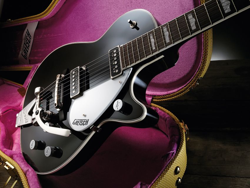 The George Harrison signature comes packaged in a gorgeous tweed case.