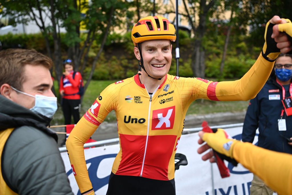TROMSO NORWAY AUGUST 05 Markus Hoelgaard of Norway and UNO X Pro Cycling Team celebrates at finish line as stage winner during the 8th Arctic Race Of Norway 2021 Stage 1 a 1425km stage from Troms to Troms ArcticRace on August 05 2021 in Tromso Norway Photo by Stuart FranklinGetty Images