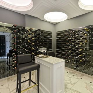 wine room with white table and black chair