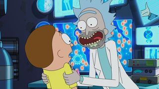 (R to L) Rick is grabbing Morty while he talks about Rick and Morty season 7