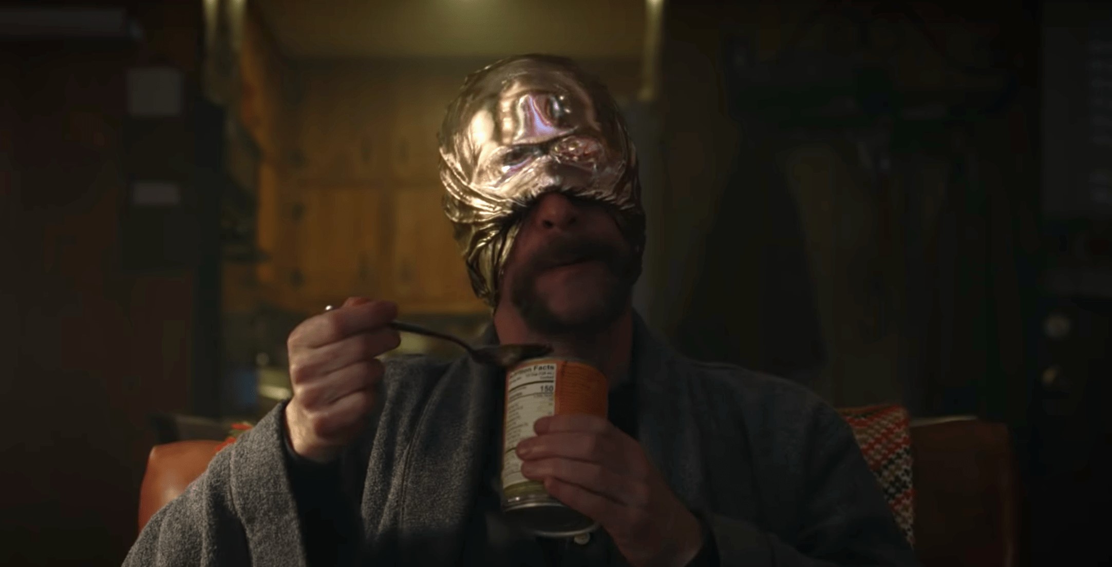 looking glass eating a can of beans on watchmen