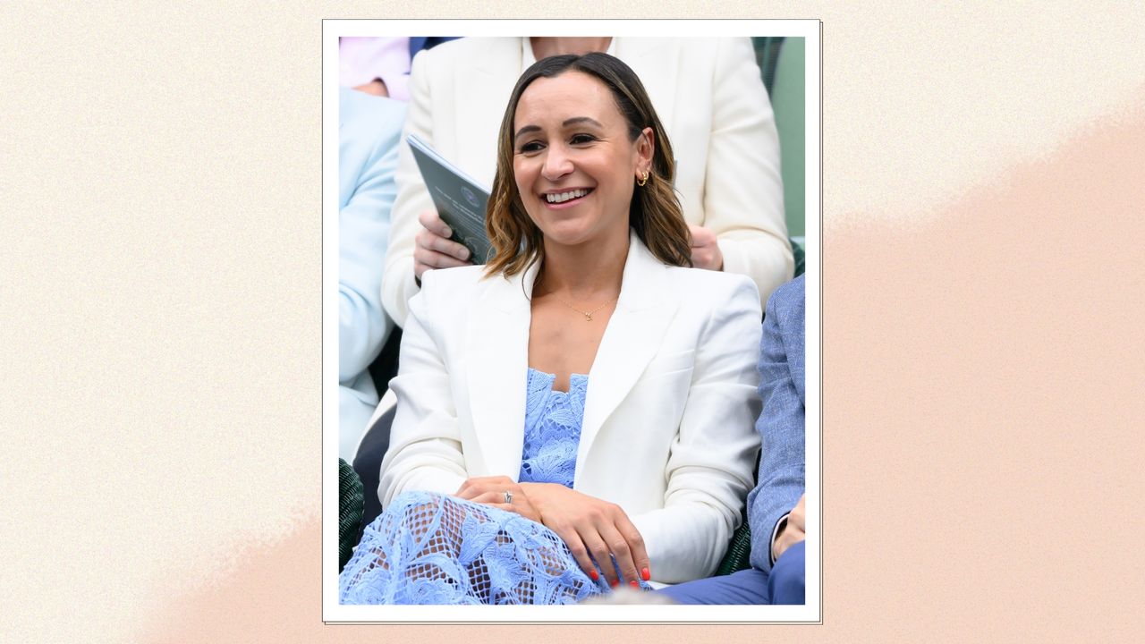 Portrait of Jessica Ennis-Hill smiling wearing a blue lace dress and white blazer with orange nails