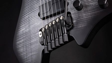 A close-up of the new Arc Tilt tremolo bridge on a Strandberg guitar