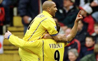 Olivier Dacourt celebrates with Mark Viduka of Leeds during the FA Carling Premiership game between Charlton Athletic v Leeds United at The Valley, Charlton.