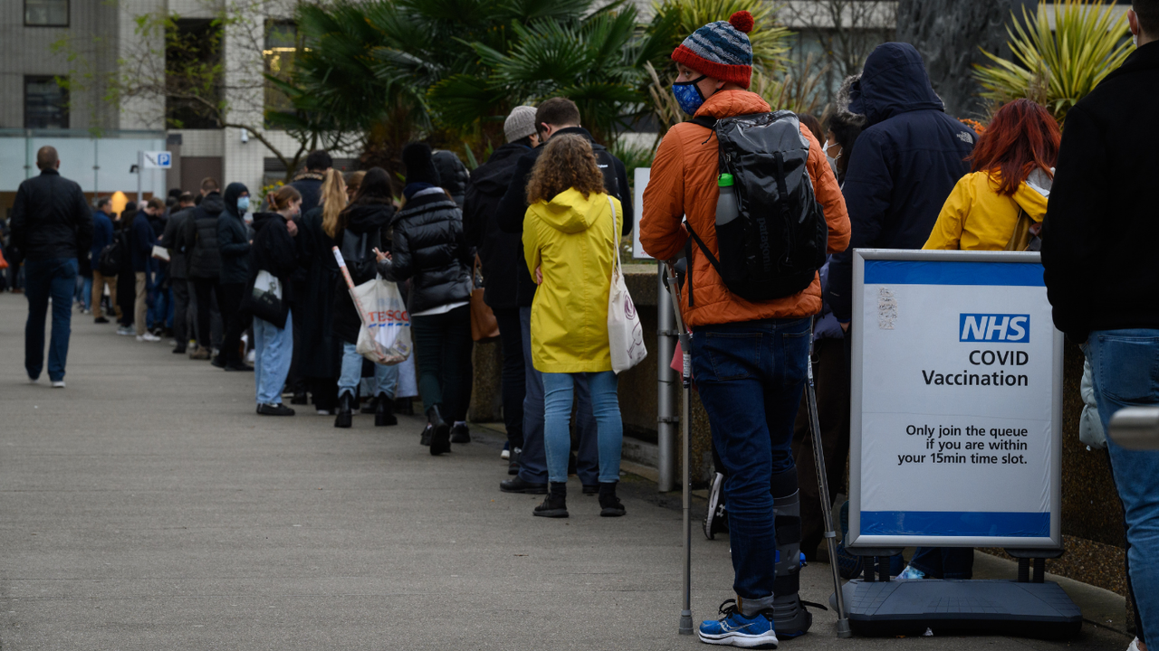 The queue for booster jabs at St Thomas’ Hospital, London