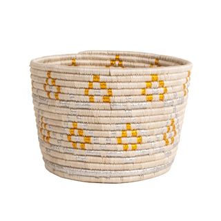Gold and silver patterned natural woven storage basket