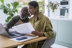 Couple looking at bills