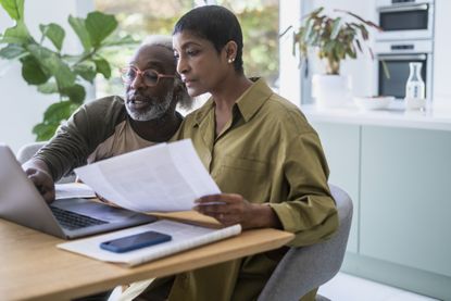 Couple looking at bills