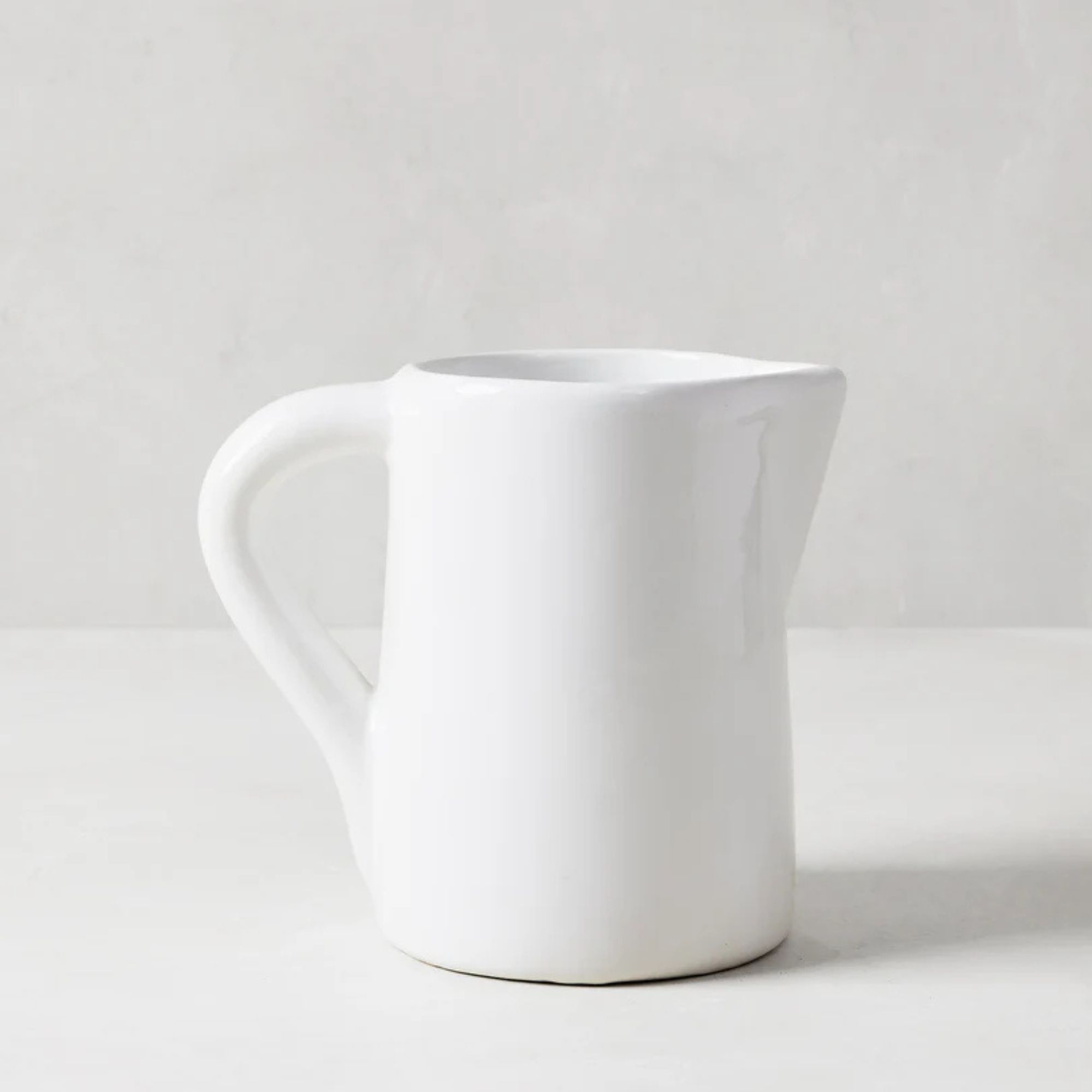 Small white ceramic pitcher