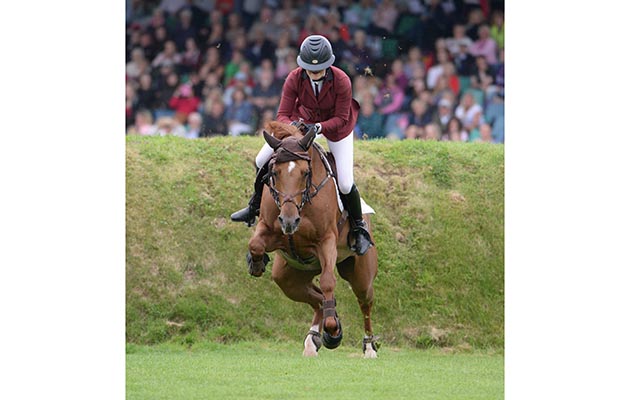 Georgia Tame and Bolien stumble awkwardly at Hickstead