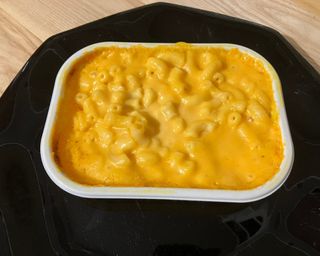 Using the Panasonic 1.4 cu.ft. Alexa-Enabled Inverter Microwave to heat ready-made mac and cheese