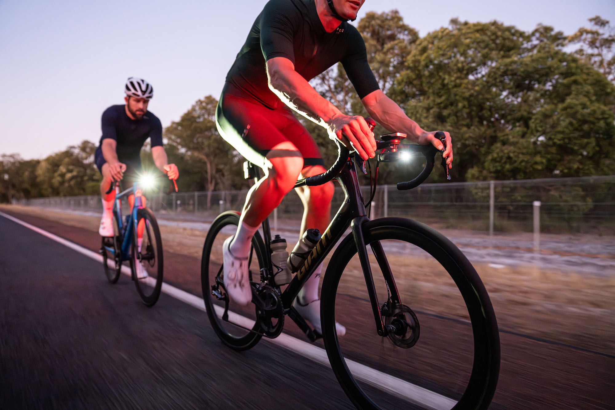 Cycliq Fly12 Sport front light being ridden at night