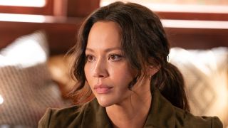 Lucy sitting down on The Rookie.