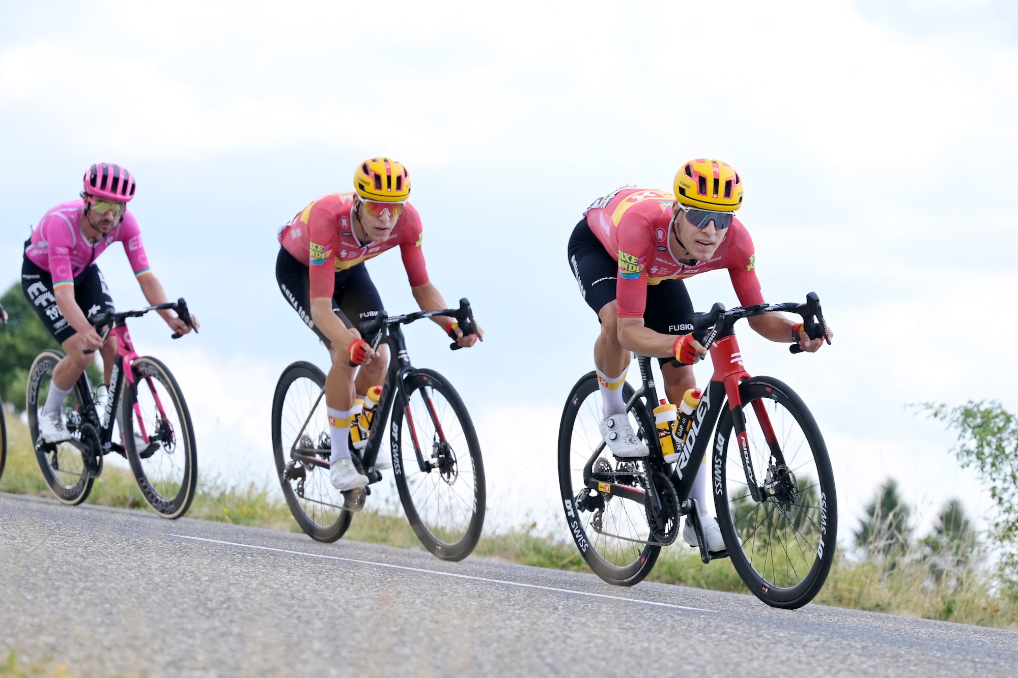 Uno-X Mobility twins Tobias Halland Johannessen and Anders Halland Johannessen with Ben Healy (EF Education-EasyPost) in the six-rider break