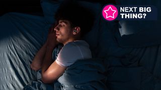 A man sleeping while listening to Somnibuds earphones