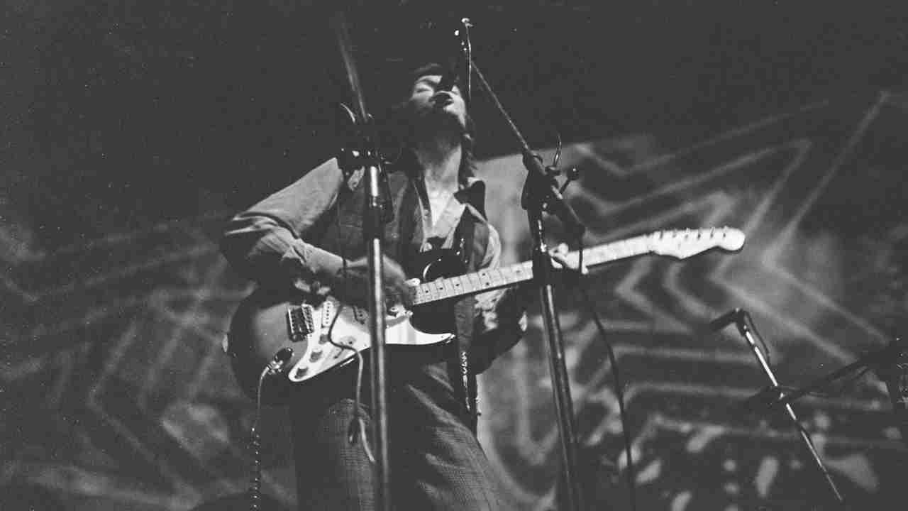Eric Clapton performing onstage with Derek &amp;amp; The Dominos in 1970