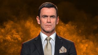 Jack Branning wearing a suit surrounded by yellow smoke.