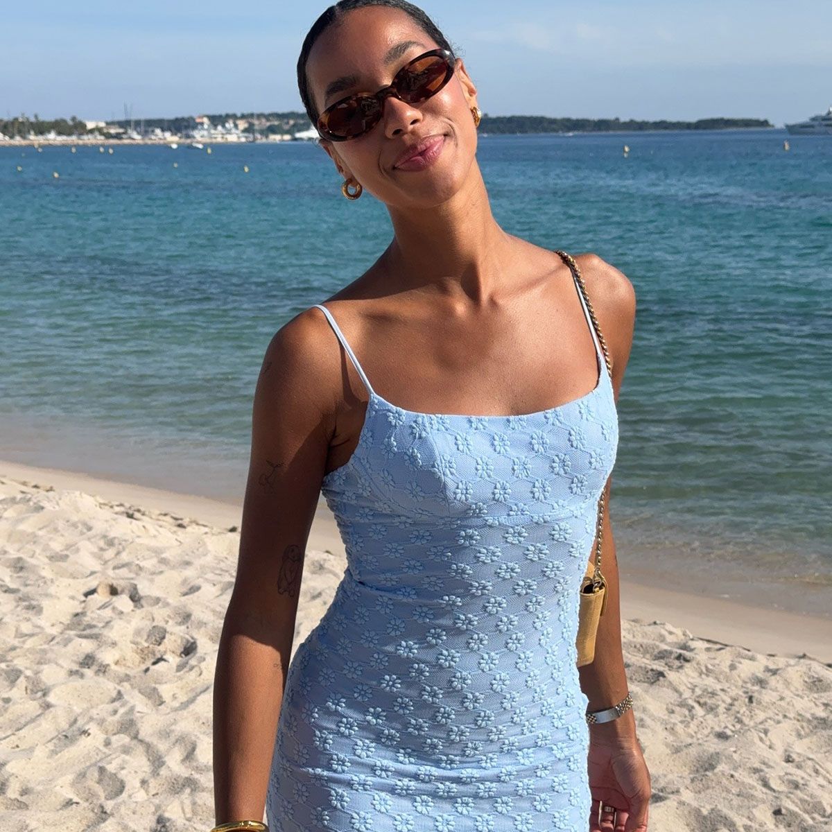 Woman in pale blue dress