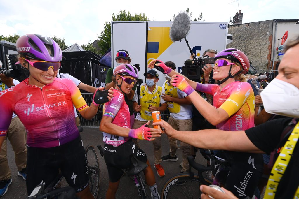 BARSURAUBE FRANCE JULY 27 LR Marlen Reusser of Switzerland Ashleigh Moolman Pasio of South Africa and Demi Vollering of Netherlands and Team SD Worx celebrates the victory during the 1st Tour de France Femmes 2022 Stage 4 a 1268km stage from Troyes to BarSurAube TDFF UCIWWT on July 27 2022 in BarsurAube France Photo by Tim de WaeleGetty Images