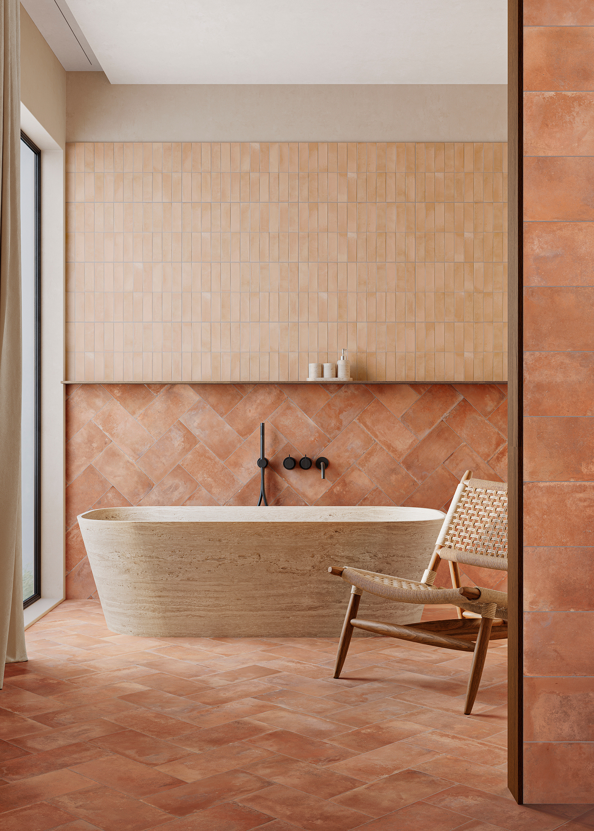 full terracotta tiled bathroom with a freestanding wooden bath