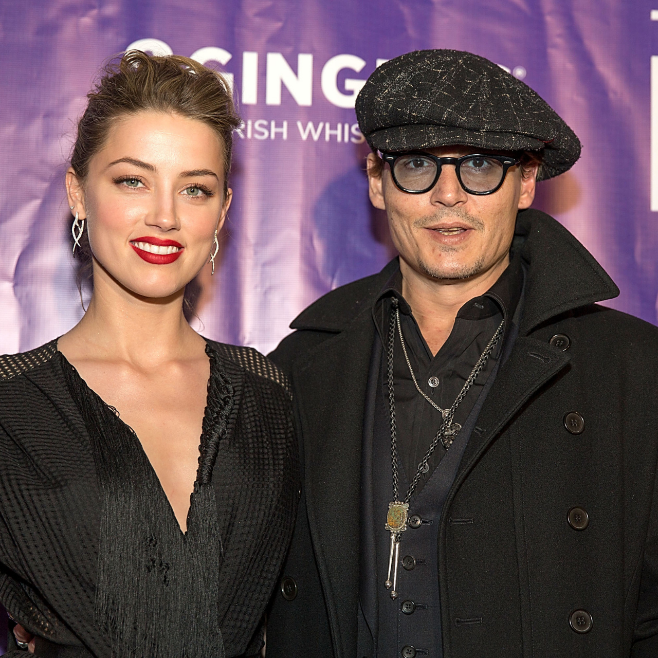 Amber Heard and Johnny Depp attend the Texas Film Hall of Fame Awards in 2014