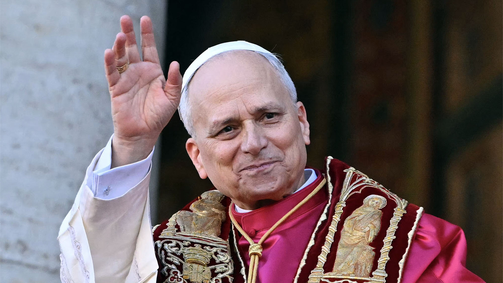 Pope Leo waving to crowds at the Vatican