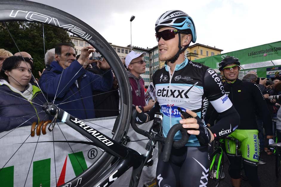 Matteo Trentin makes his way to the traffic jam at sign on