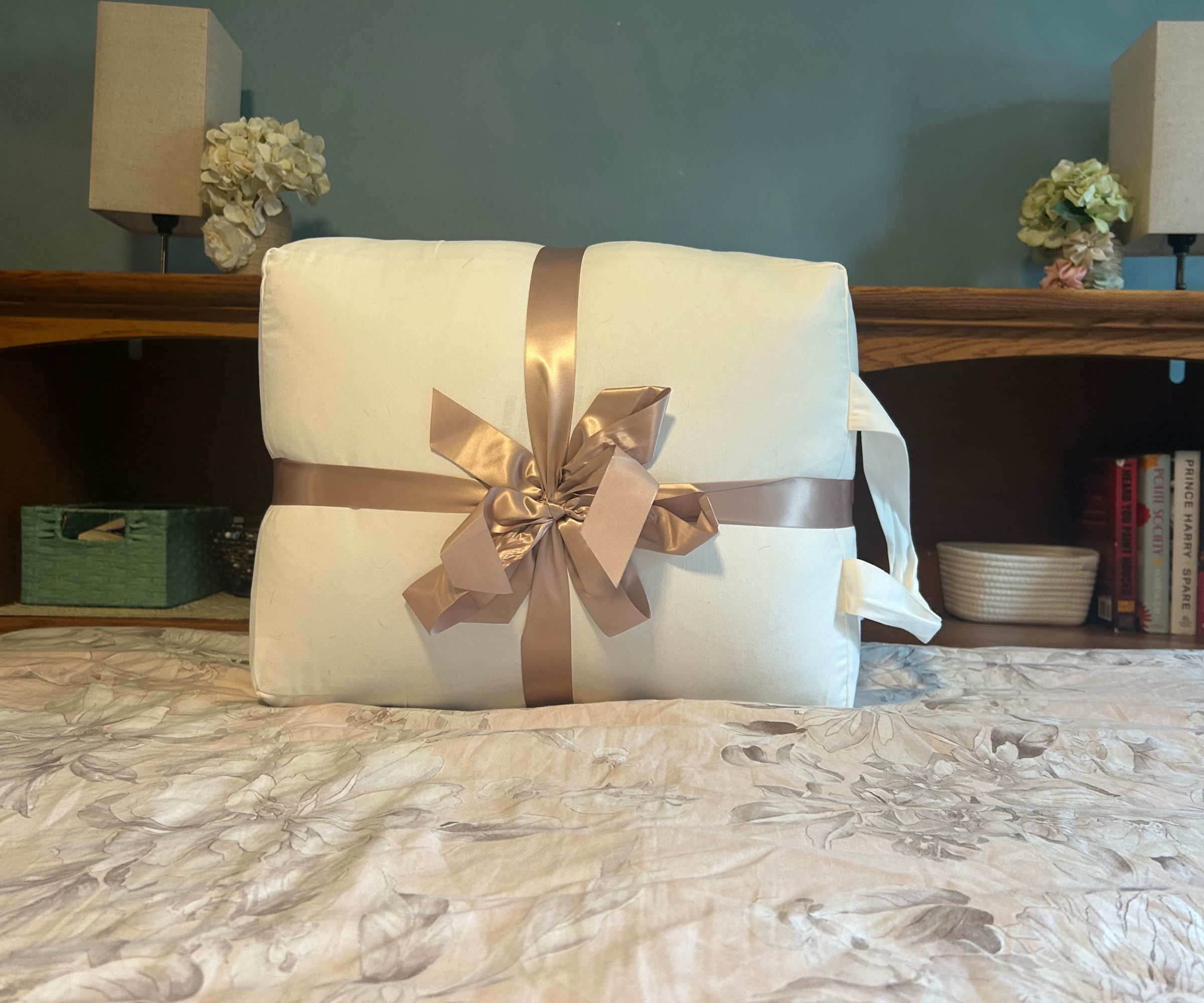 Comforter wrapped in a canvas bag and ribbon